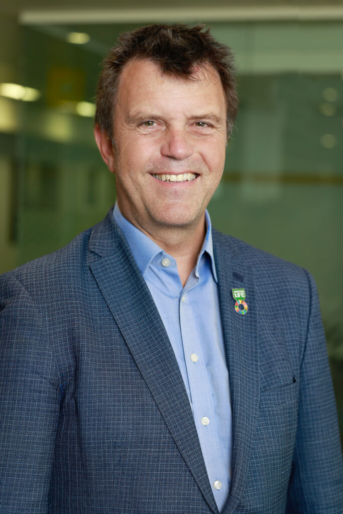 A headshot of Nigel Topping.